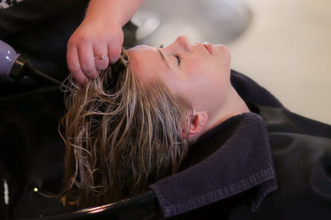 Photo of a hairdresser treating hair